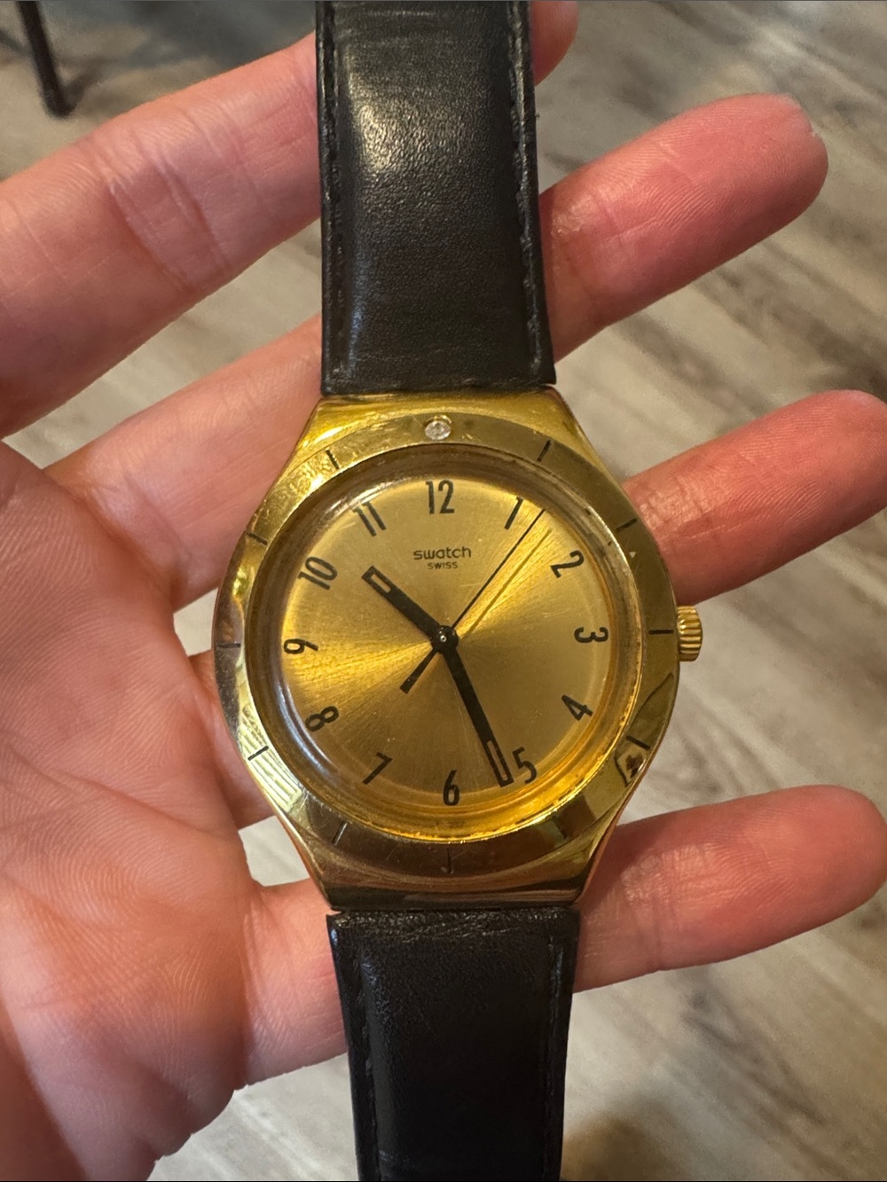 Swatch Gold Dial with Black Leather Strap